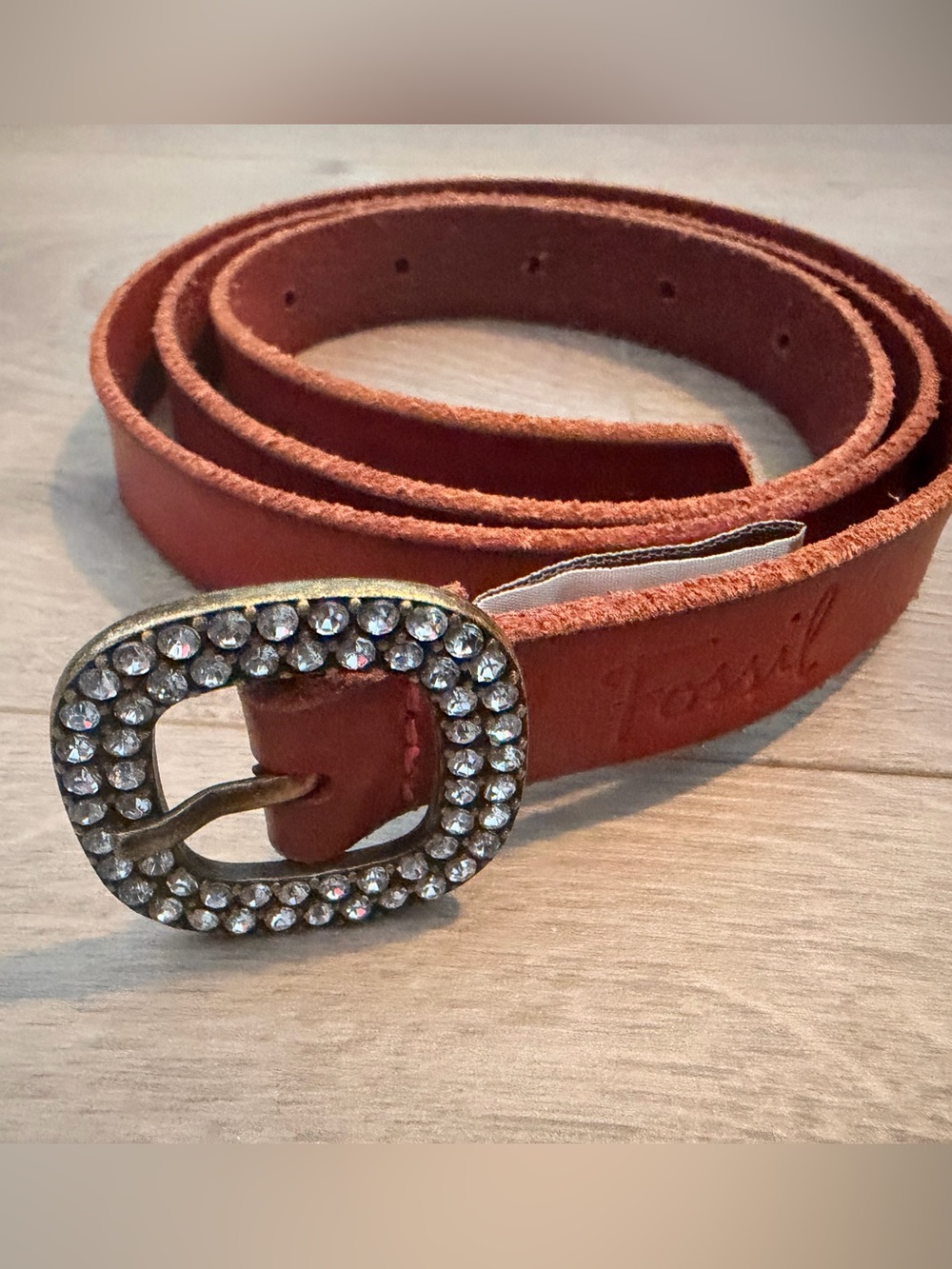 Fossil dark red belt with gold rhinestone buckle. Size medium